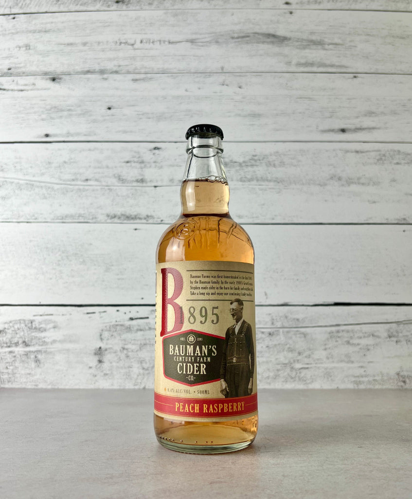 Photo of a 500 mL bottle of Bauman's Cider Peach Raspberry