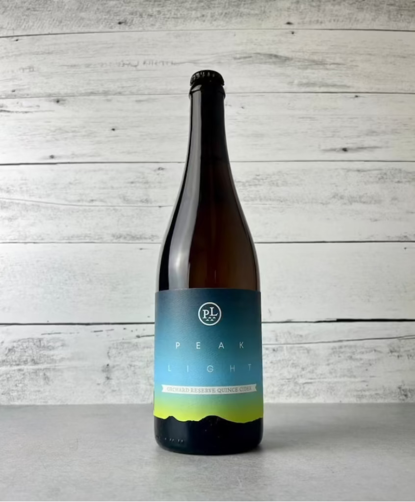 750 mL bottle of Peak Light Orchard Reserve Quince Cider