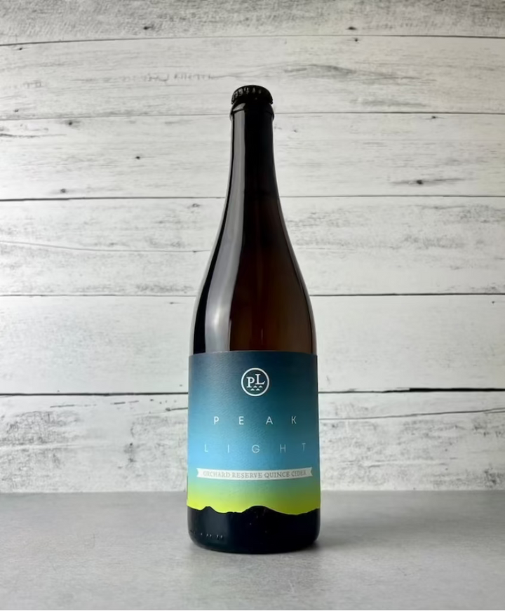750 mL bottle of Peak Light Orchard Reserve Quince Cider