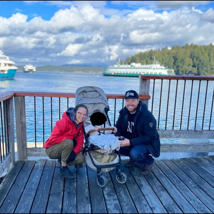 Photo of Storie, Erik, and their little one on a recent trip to San Juan Island (October '22)