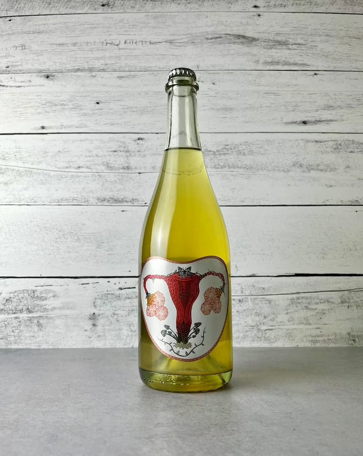 750 mL bottle of Art + Science Fruitful Pet Nat Cider with art label depicting a uterus