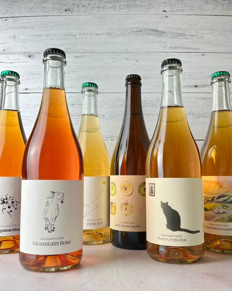 Six 750 mL bottles of Bauman's Cider