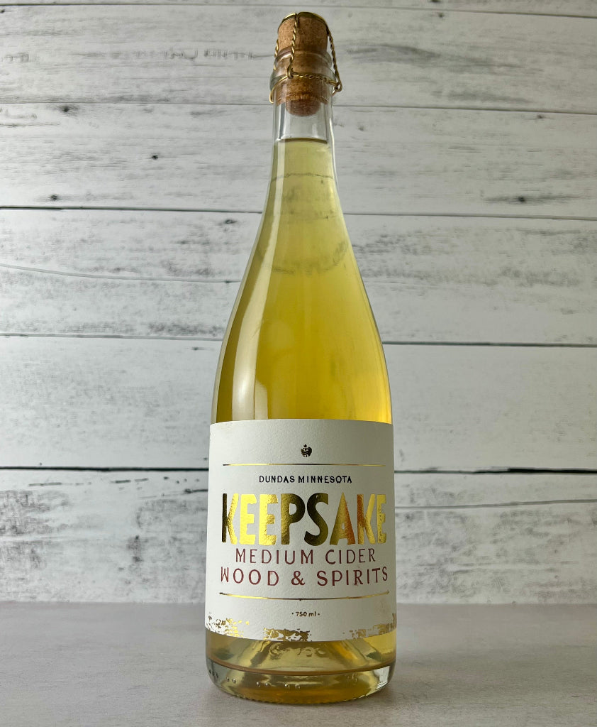 Photo of a 750 mL bottle of Keepsake Cidery - Medium Cider Wood & Spirits