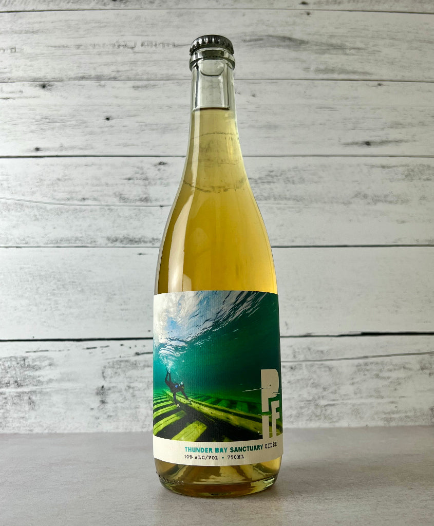 Photo of a 70 mL bottle of Presque Isle Farm (PIF) Cider - Bourbon Barrel Aged Thunder Bay Sanctuary Cider