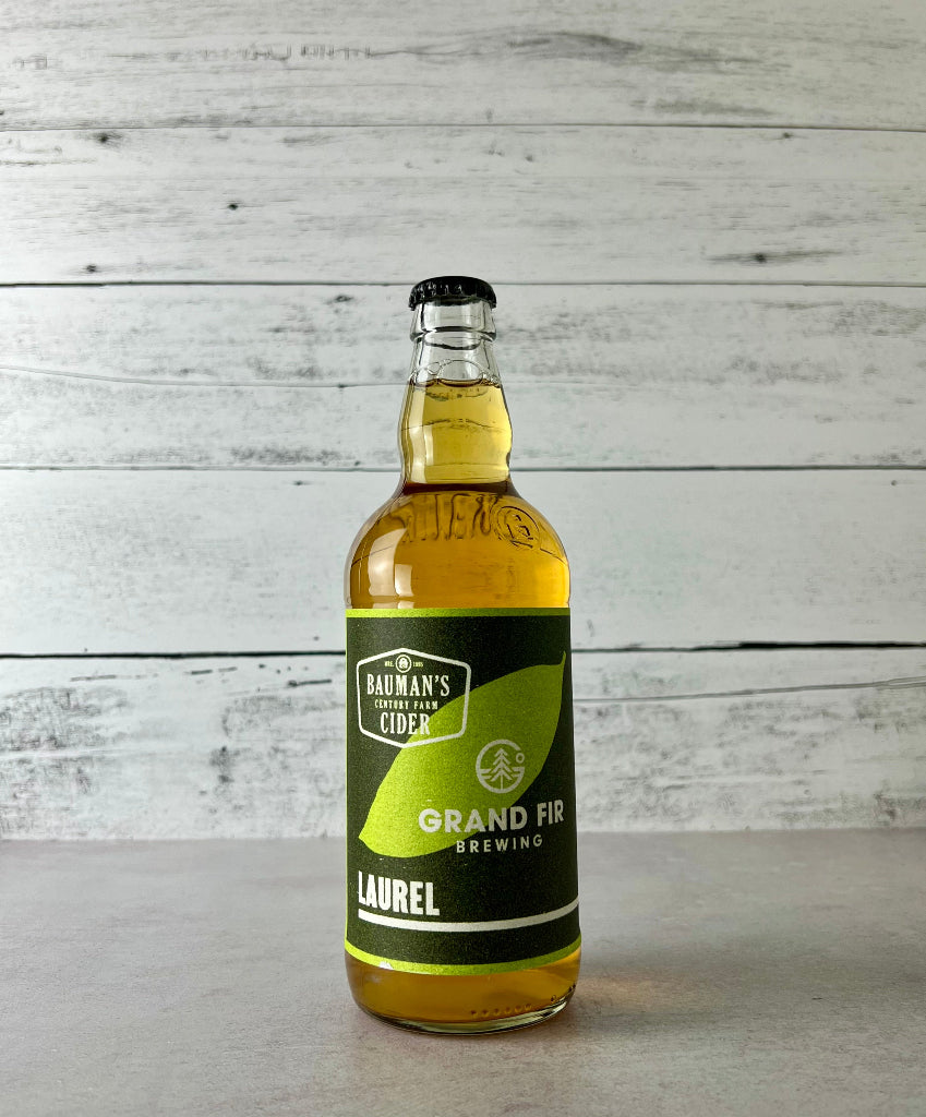 Photo of a 500 mL bottle of Bauman's Century Farm Cider - Grand Fir Brewing collaboration - Laurel Cider