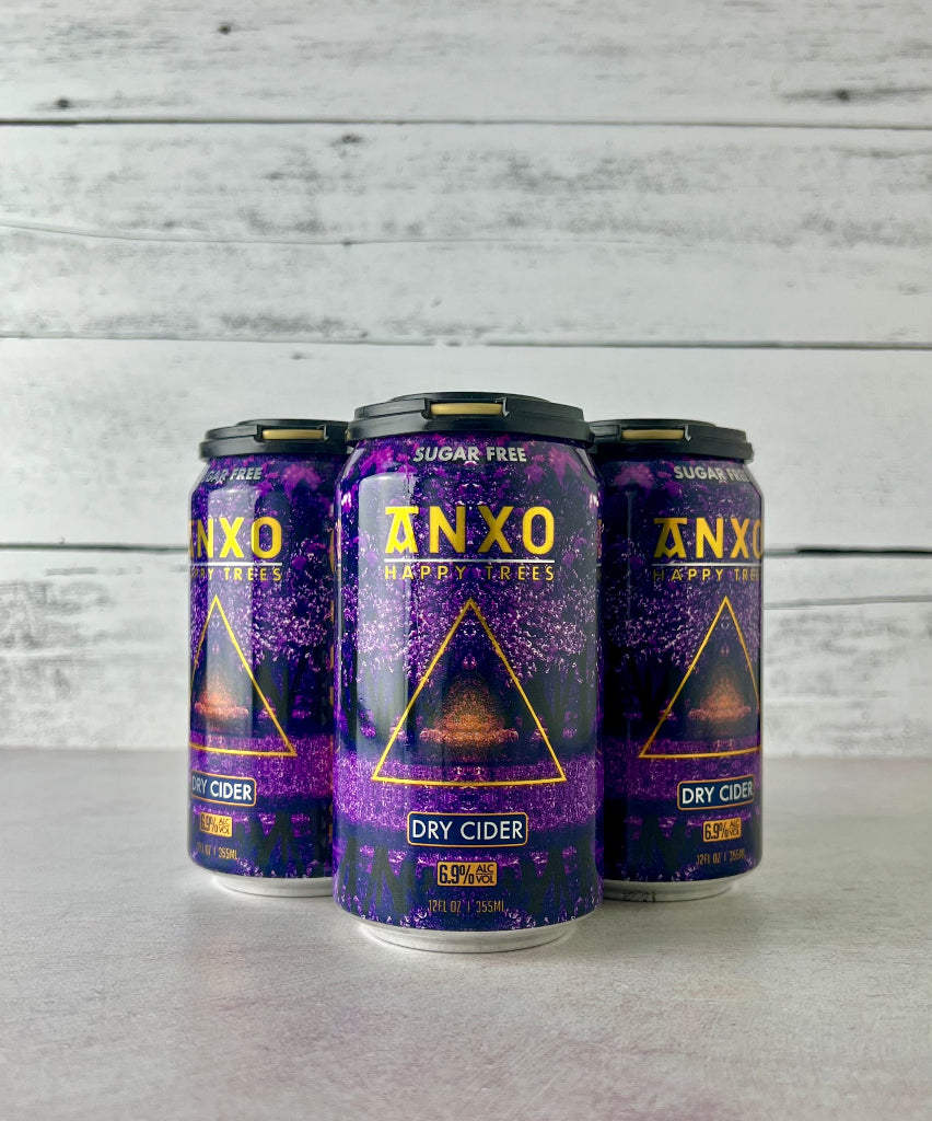 Photo of a 4-pack of 12 oz cans of Anxo Happy Trees Dry Cider