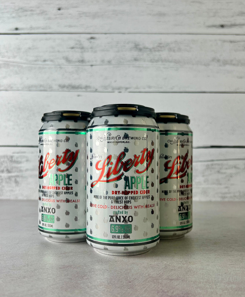 Photo of a 4-pack of 12 oz cans of Anxo Cider - Liberty Apple Dry-Hopped Cider