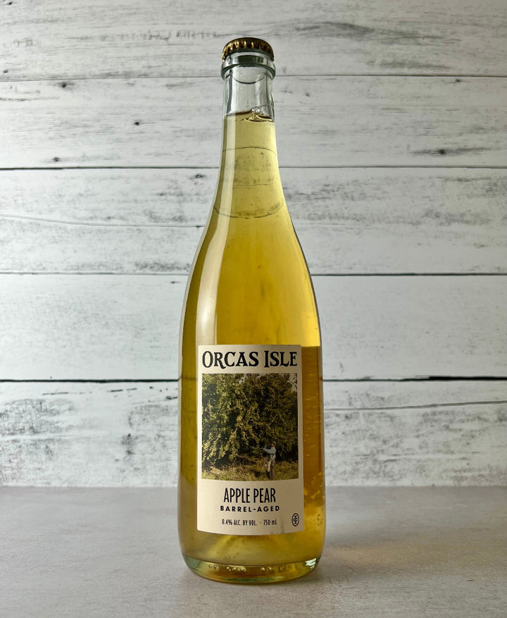 Photo of a 750 mL bottle of Orcas Isle Orchard Cider Apple-Pear Barrel-Aged Cider