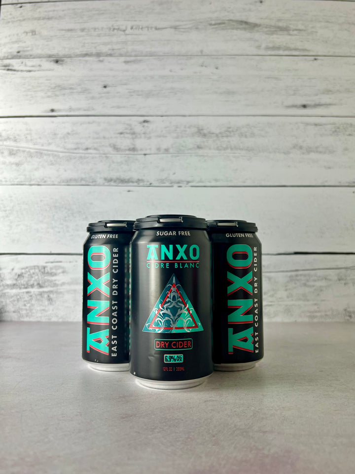 Photo of a 4-pack of 12 oz cans of Anxo Cidre Blanc - Dry Cider