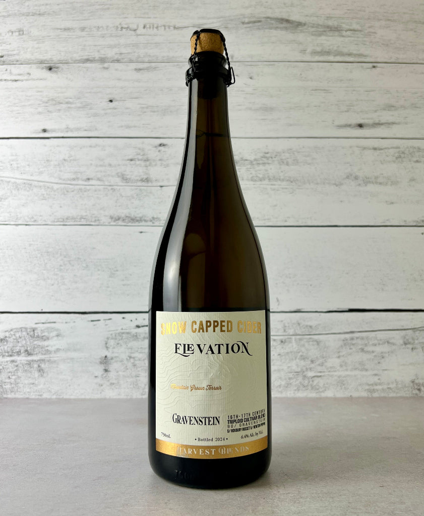 Photo of a 750 mL bottle of Snow Capped Cider - Elevation Gravenstein