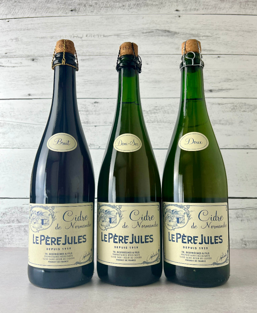 Photo of 3 750 mL bottles of Le Pere Jules Cidre de Normandie - Brut, Demi-Sec, and Doux