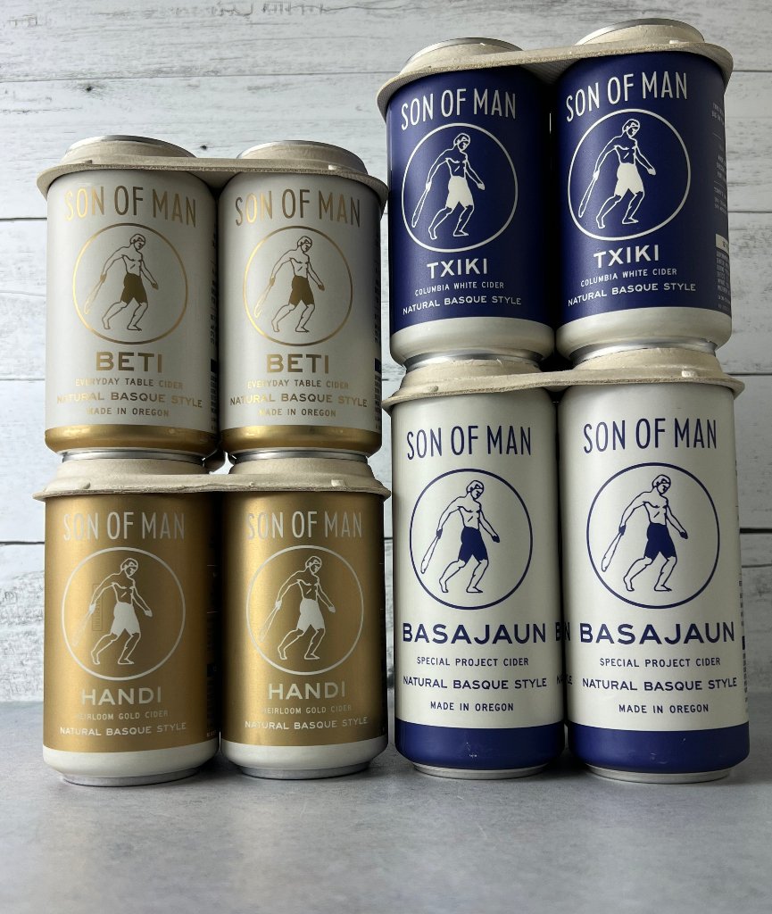 Four 4-packs of canned cider from Son of Man, inclduing Beti, Txiki, Handi, and Basajuan