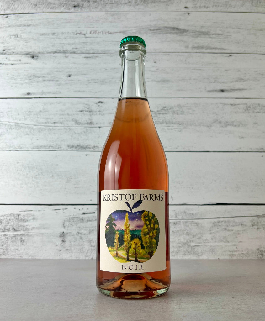 Photo of 750 mL Bottle of Kristof Farms Noir wine on a white surface with a white wooden background