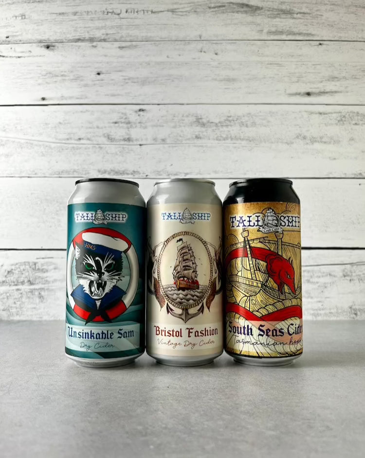 Three 16 oz cans of Tall Ship ciders - Unsinkable Sam Dry Cider, Bristol Fashion Vintage Dry Cider, and South Seas Cider Tasmanian Hops