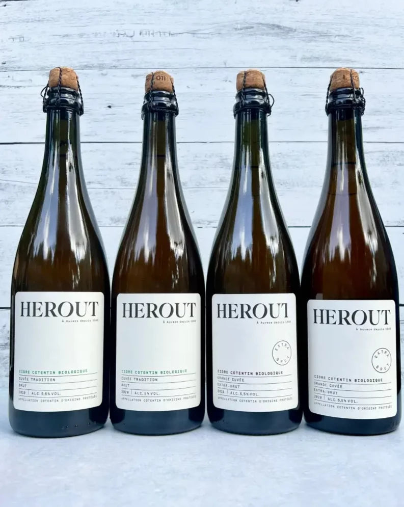 Four 750 mL bottles of Herout Brut (2019 and 2020) and Herout Extra Brut (2019 and 2020) French cider