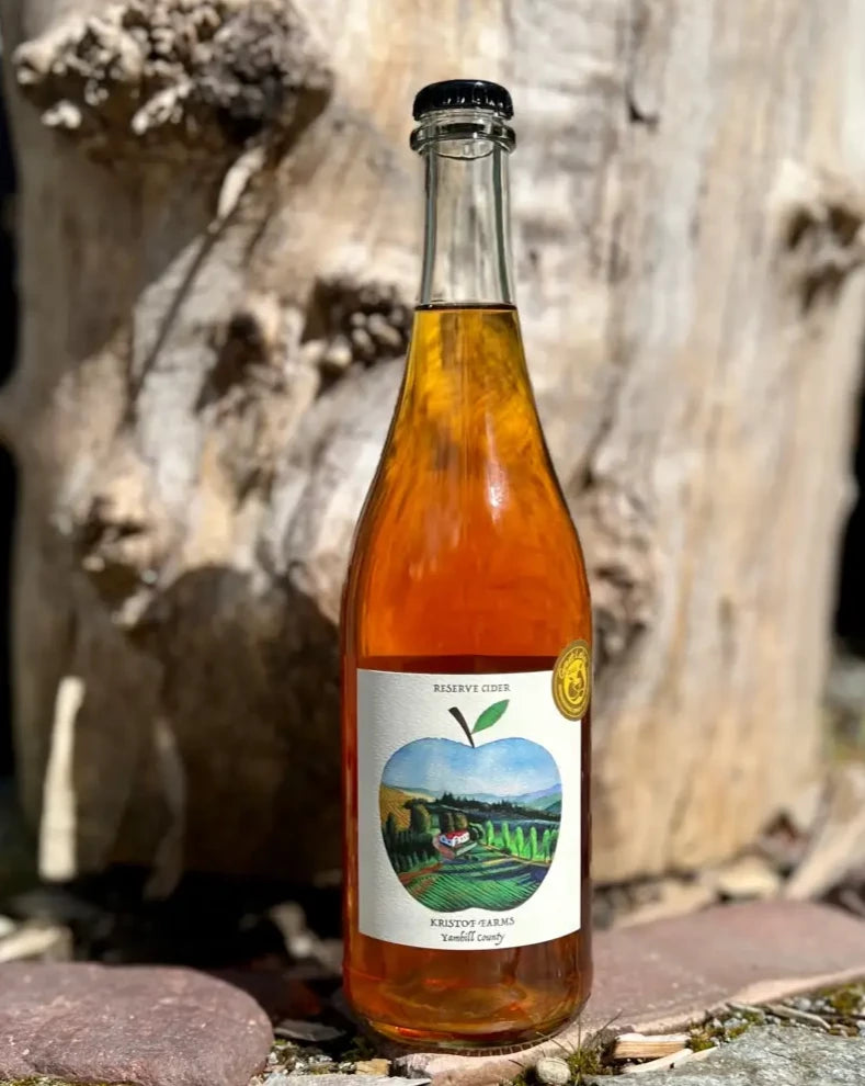 Clear 750 mL bottle of Kristof Farms Reserve Cider