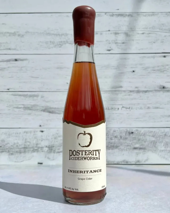 375 mL bottle of Posterity Ciderworks Inheritance Grape Cider