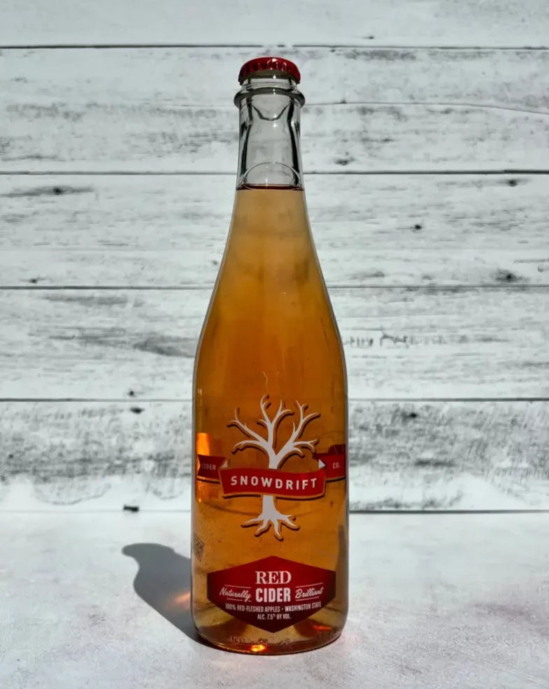 500 mL clear glass bottle of pink-hued Snowdrift Red Cider - Naturally Brilliant